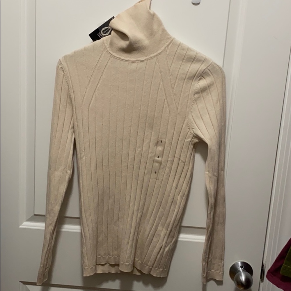 Brand new Ladies Cream knitted turtleneck